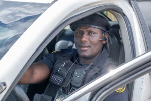 Syltarex Prophete, Co-Owner of Two Friends Security LLC, in uniform during a patrol shift in Orlando, FL