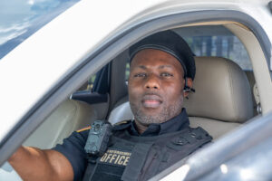 Anthony Saint Pierre, Operations Lead at Two Friends Security LLC, in uniform during a patrol shift in Orlando, FL